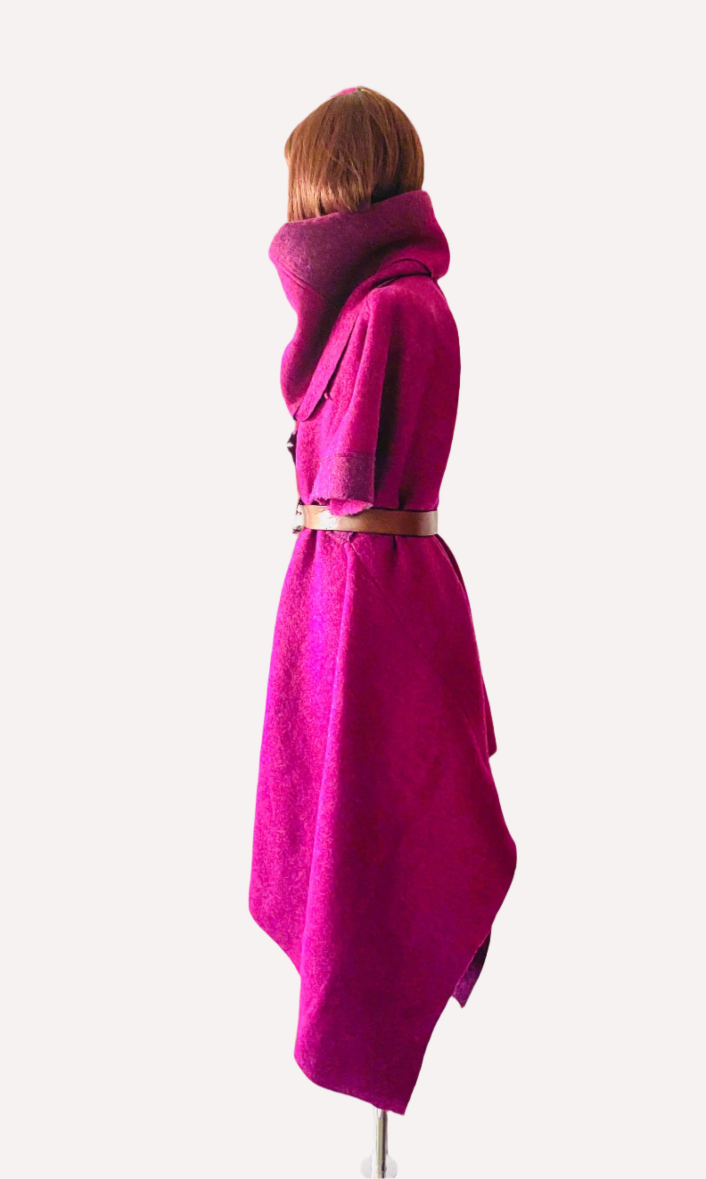 “Woolen Splendor: Embrace Asymmetry with this woollen coat made in wool