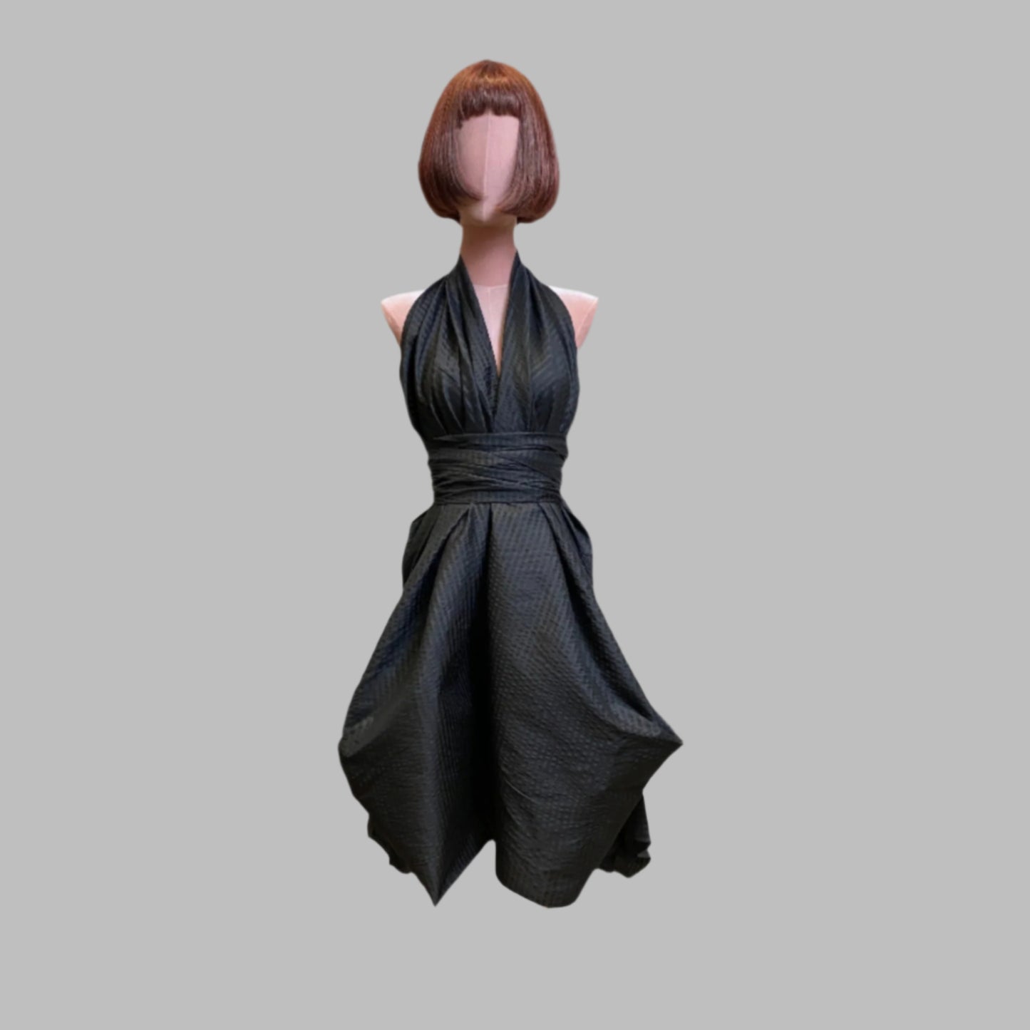 Black silk goddess dress with a timeless, graceful silhouette.