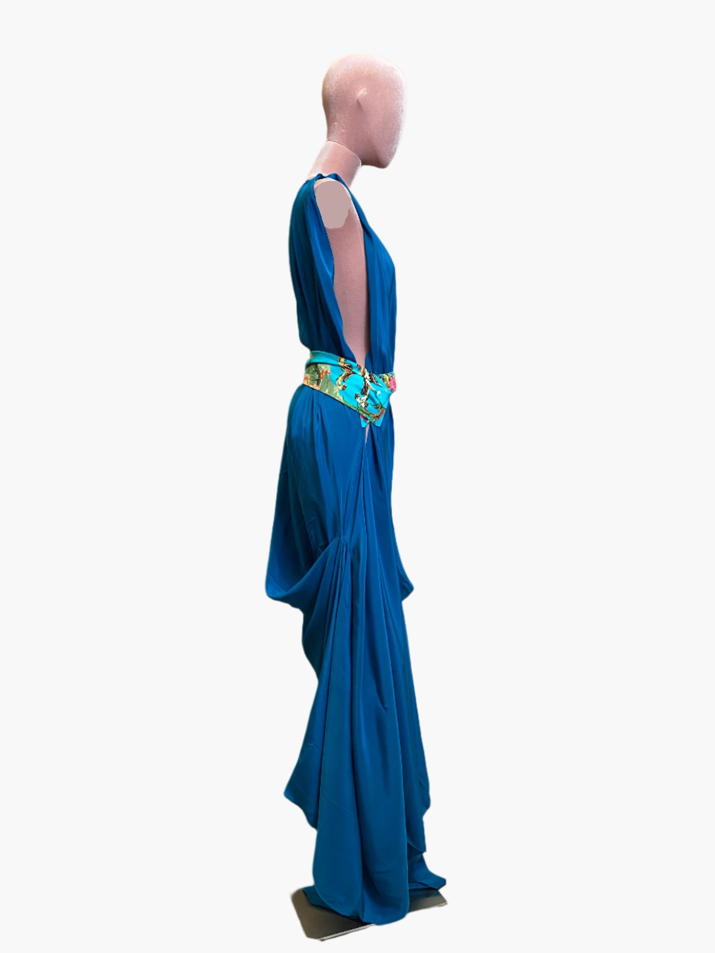 Elegant turquoise silk goddess dress with flowing drape and flattering silhouette.Wide attached multicoloured sash belt.