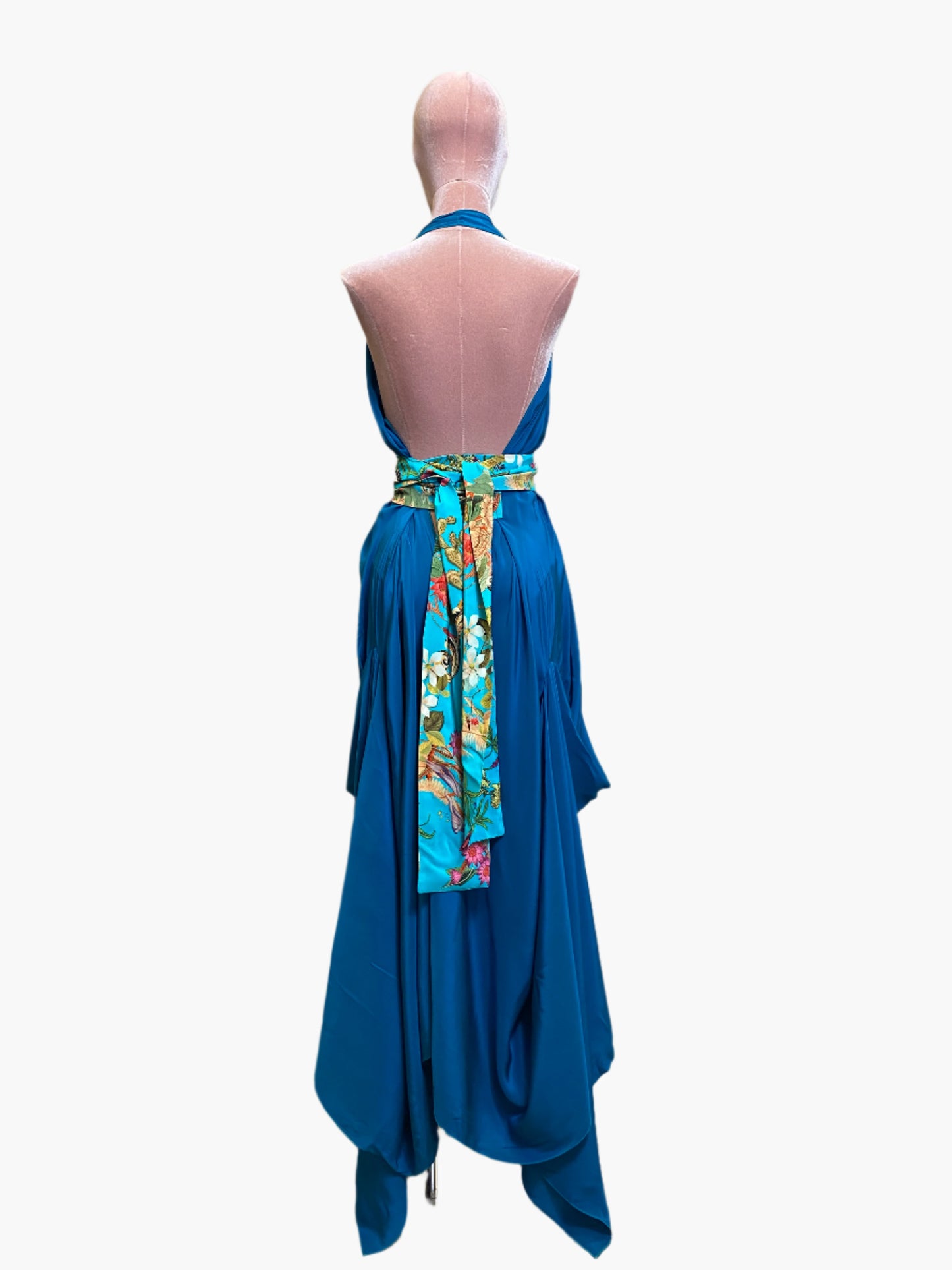 Elegant turquoise silk goddess dress with flowing drape and flattering silhouette.Wide attached multicoloured sash belt.
