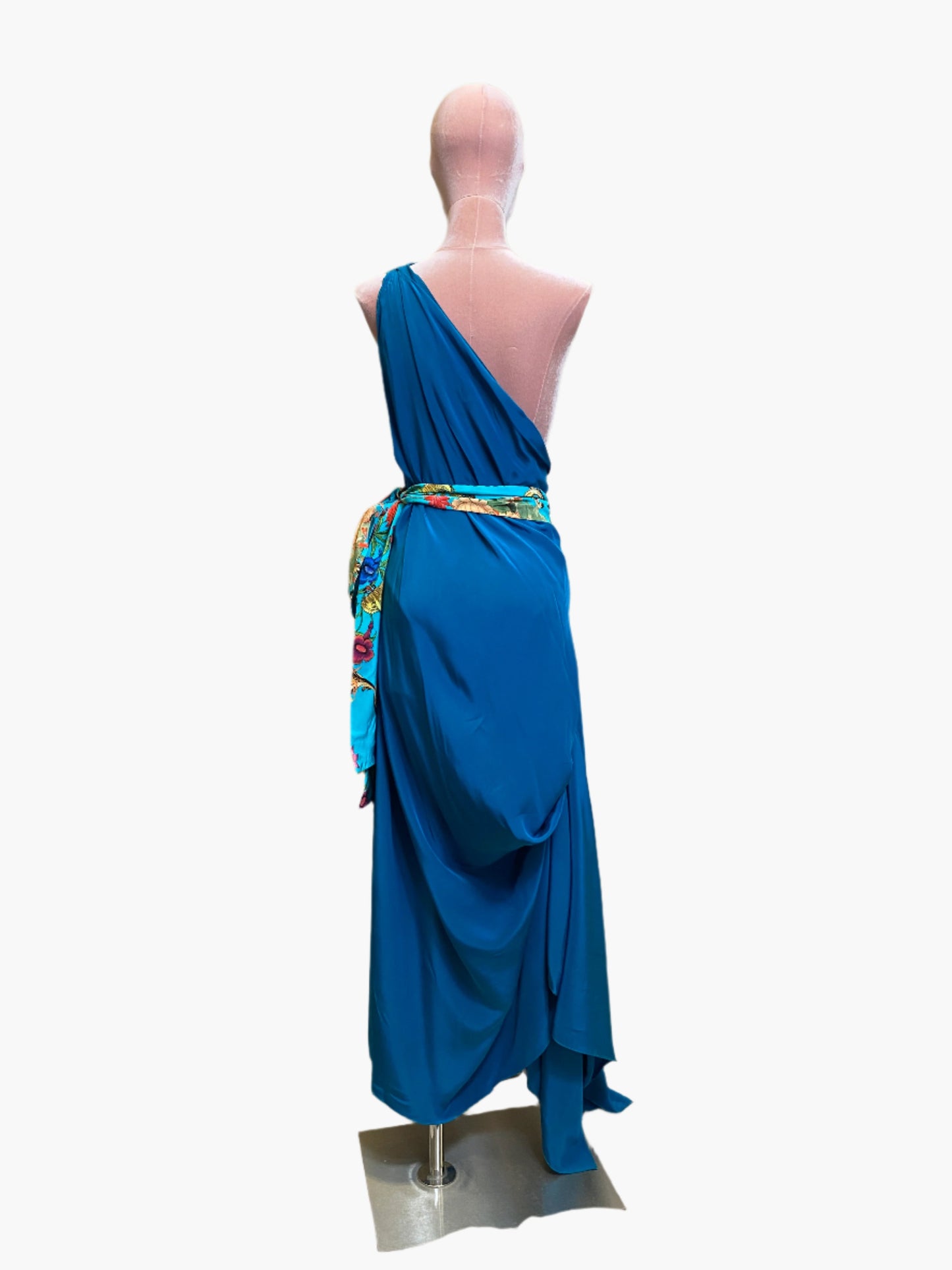 Elegant turquoise silk goddess dress with flowing drape and flattering silhouette.Wide attached multicoloured sash belt.