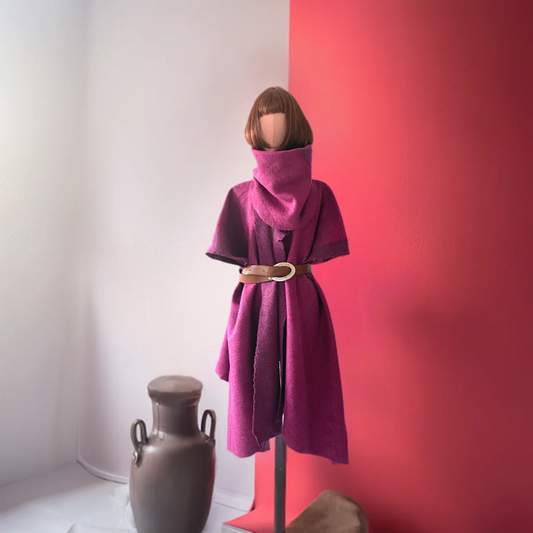 “Woolen Splendor: Embrace Asymmetry with this woollen coat made in wool