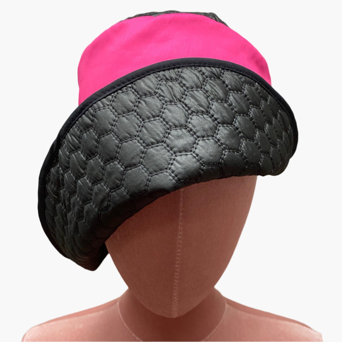 Handmade vintage-style,in mix fibres hot pink and black fabric,with structured brim and elegant trim, perfect for classic and timeless fashion.
