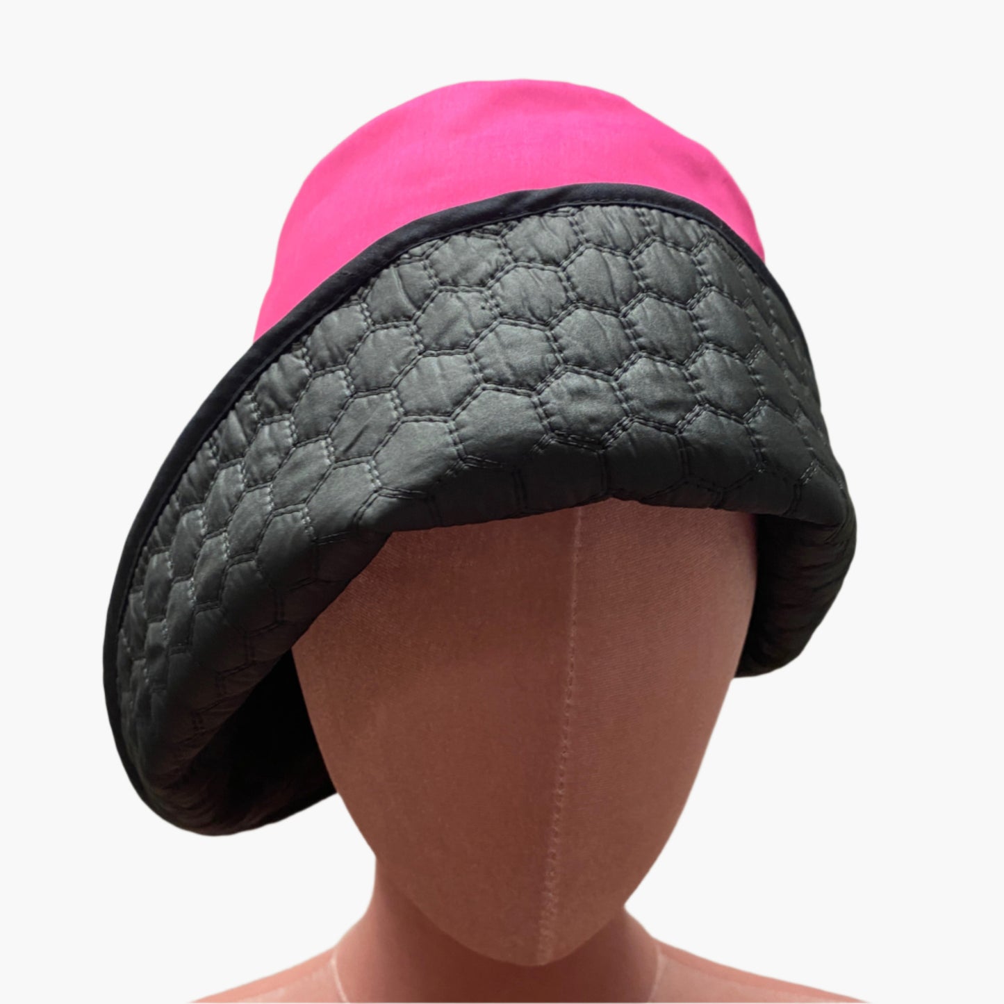 Handmade vintage-style,in mix fibres hot pink and black fabric,with structured brim and elegant trim, perfect for classic and timeless fashion.