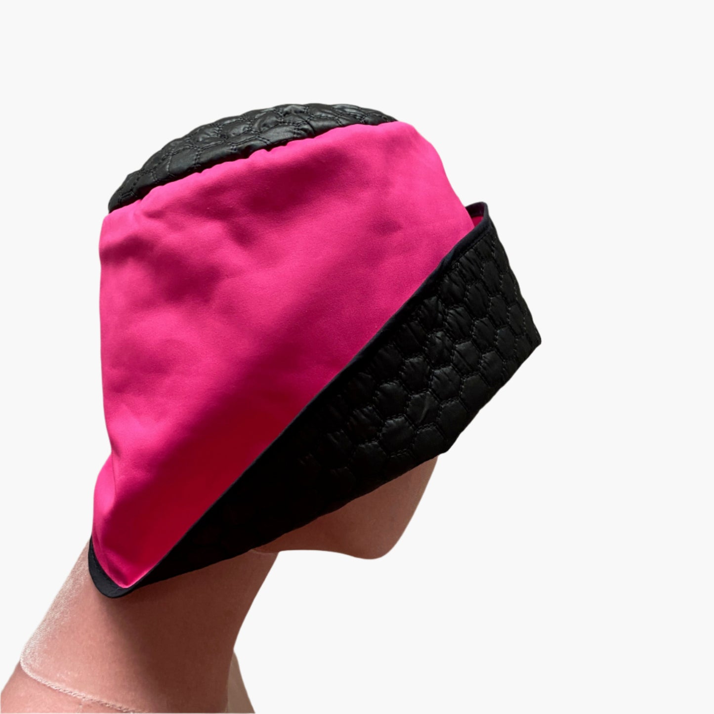 Handmade vintage-style,in mix fibres hot pink and black fabric,with structured brim and elegant trim, perfect for classic and timeless fashion.