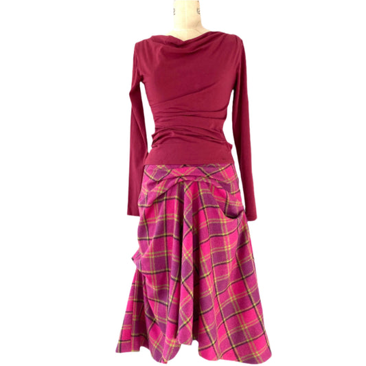Flamenco flare style skirt in check wool.Lined with viscose linings size16