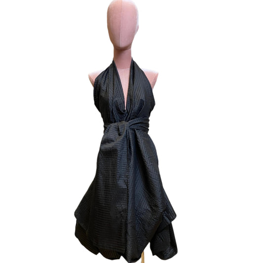 4. Black silk goddess dress with a timeless, graceful silhouette.