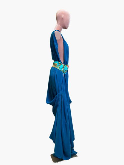 Elegant turquoise silk goddess dress with flowing drape and flattering silhouette.Wide attached multicoloured sash belt. 