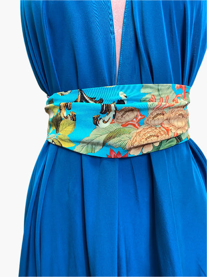 Elegant turquoise silk goddess dress with flowing drape and flattering silhouette.Wide attached multicoloured sash belt. 